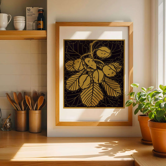 Framed artwork of leaves in a kitchen setting with potted plants and utensils.