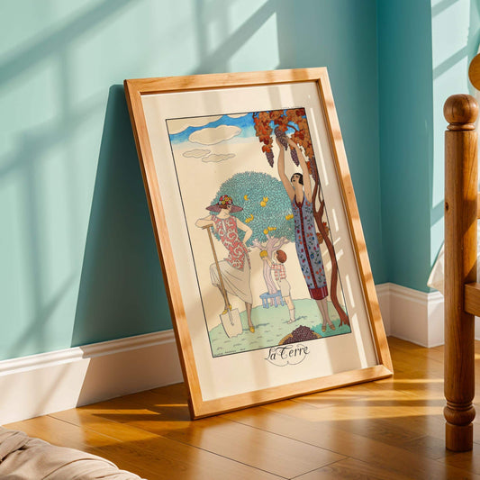 Framed artwork on a wooden floor with a light blue wall in the background