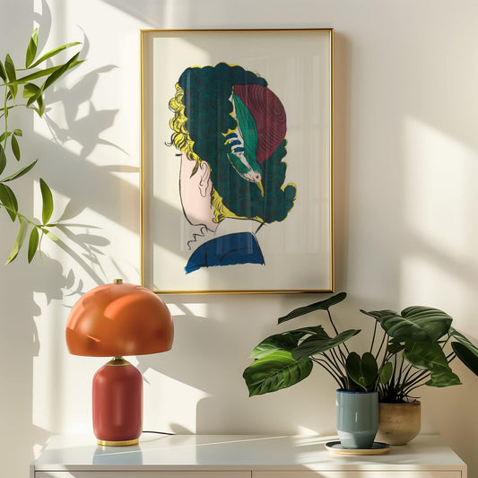 Bird in Hair by Raoul Dufy. Framed artwork of a stylized face on a wall with a lamp and plants below.