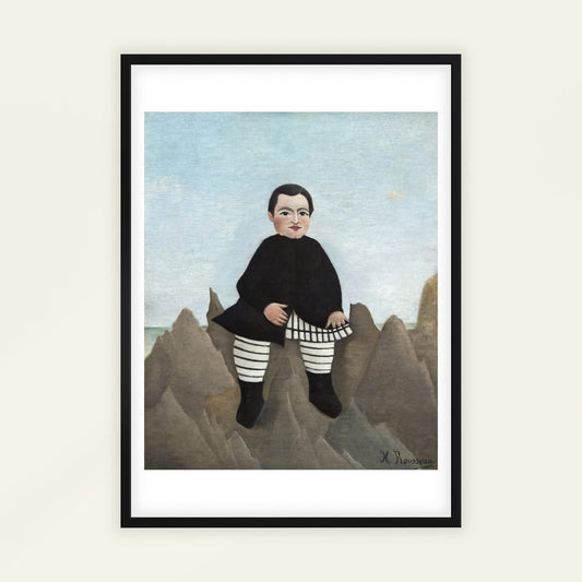 Framed artwork of a child in a black coat and striped pants standing on rocky terrain with a blue sky. Boy on the Rocks by Henri Rousseau