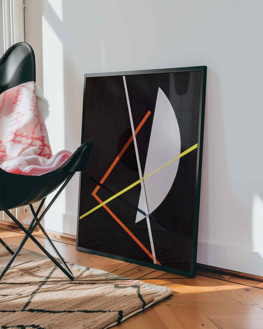 E IV (Construction VII) by Laszlo Moholy-Nagy. Abstract art piece on a wall with a chair and rug in the foreground
