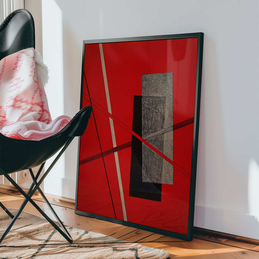 Konstruktion by Laszlo Moholy-Nagy. Abstract art piece with red background and black frame on a white wall.
