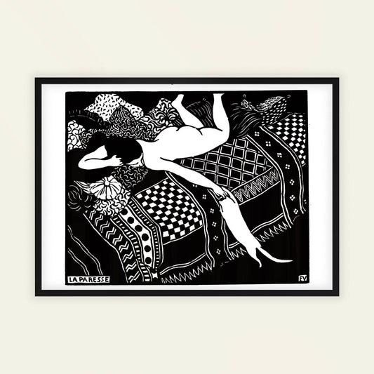 Framed black and white artwork of a woman lying on a patterned fabric. Laziness by Félix Vallotton