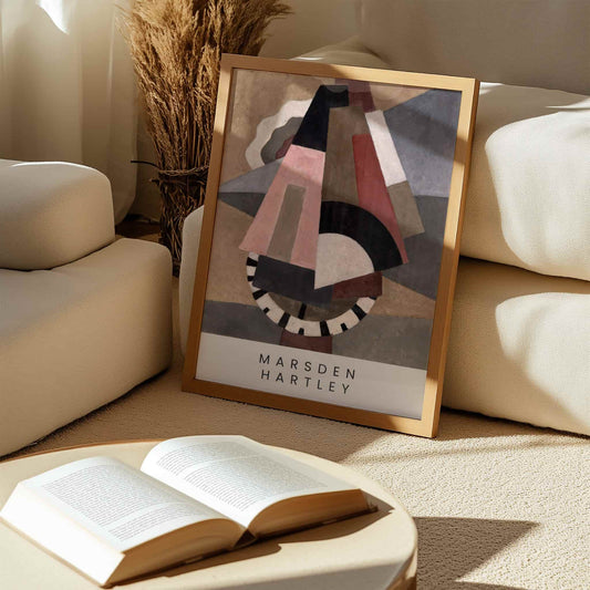 Provincetown by Marsden Hartley | With artist's name. Framed artwork by Marsden Hartley on a coffee table with an open book