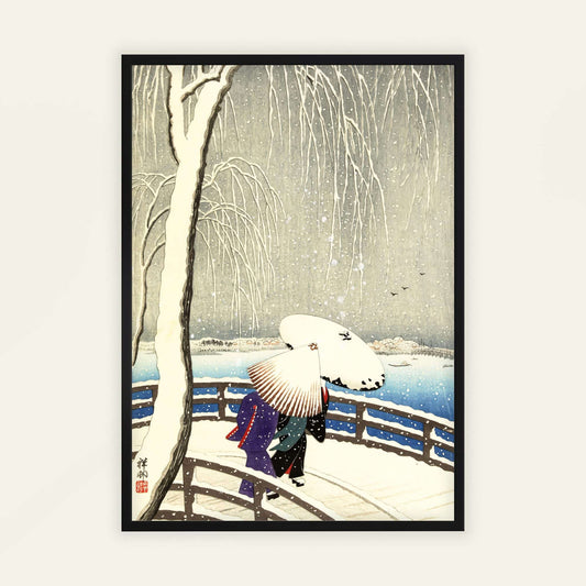 Framed artwork of a snowy scene with a person holding an umbrella and a crane. Snow on Willow Bridge by Ohara Koson