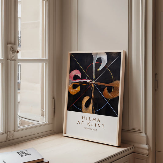 The Swan, No. 7 by Hilma Af Klint. Framed Hilma af Klint artwork on a windowsill in a room with a window.